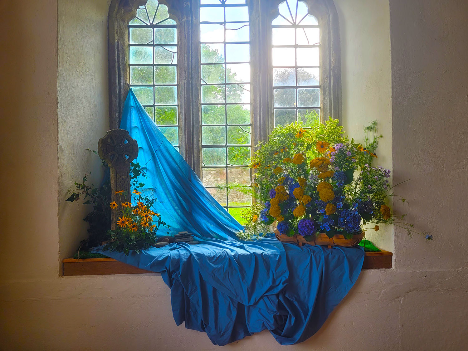 Flower festival display at St Clement's Church, Withiel
